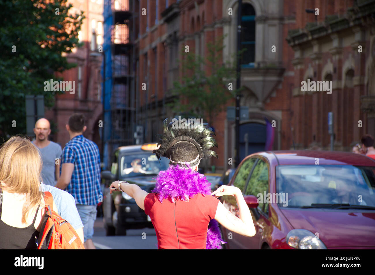 Manchester, UK. 08th July, 2017. Sparkle transgender pride, drag queen walking down the street.Credit: JazzLove/Alamy Live News Stock Photo