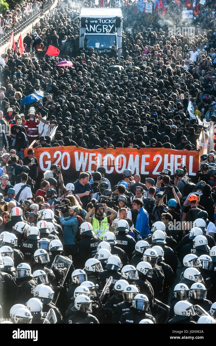 Black bloc activists at the 'Welcome to Hell' demonstration against the G20 summit in Hamburg, Germany, 6 July 2017. Photo: Markus Scholz/dpa Stock Photo