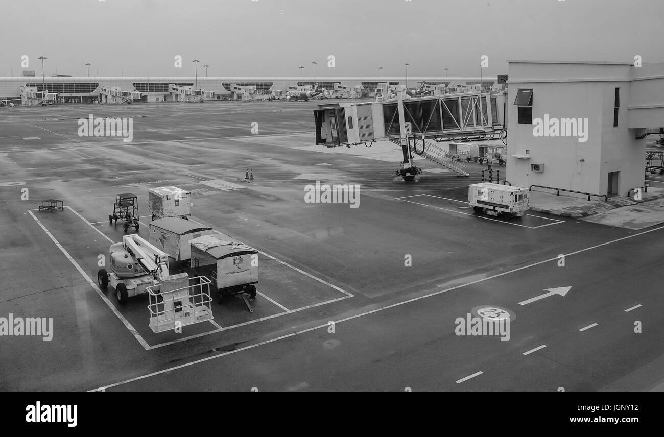 Kuala Lumpur, Malaysia - Dec 16, 2015. Vehicles on runway at KLIA2 Airport in Kuala Lumpur, Malaysia. KLIA2 has a built-up area of 257,845 sqm with 68 Stock Photo