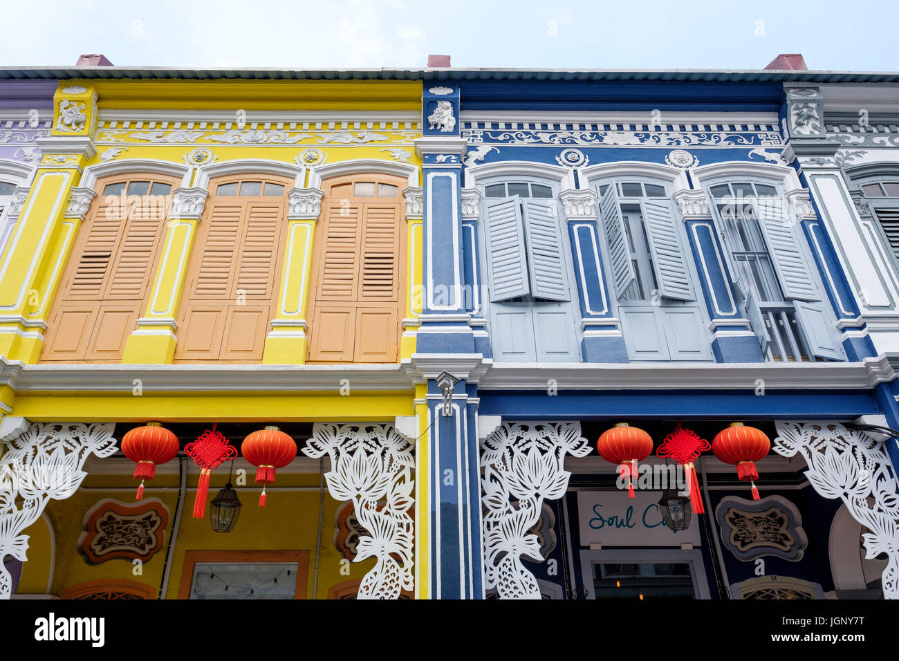 Renovated façades of mixed-style (colonial and Peranakan, or Straits Chinese) shophouses, George Town, Pulau Pinang, Malaysia. Stock Photo