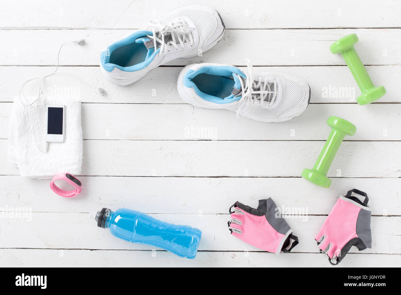 Various Fitness Tools on White Wood Stock Photo
