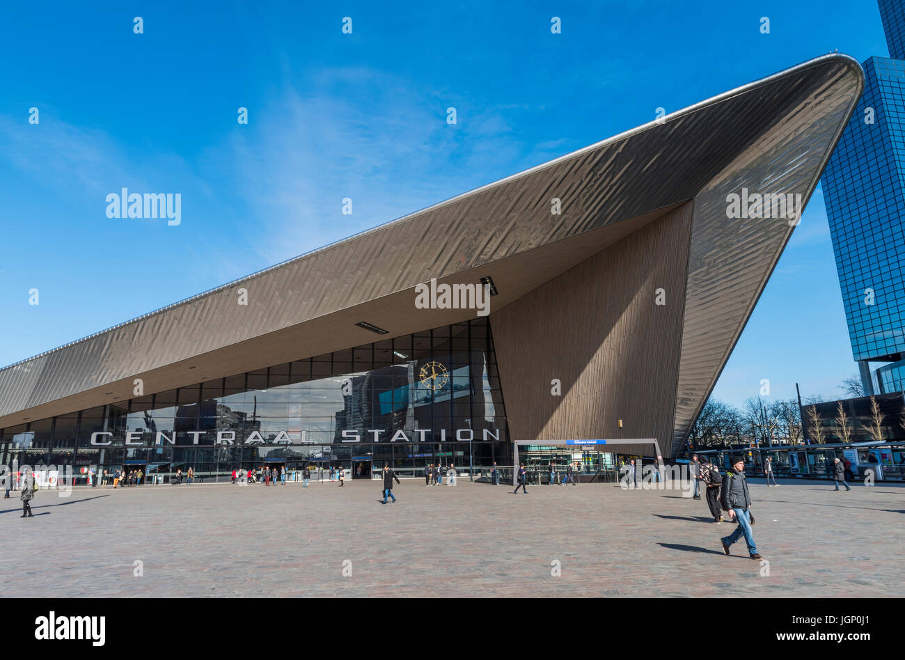 Rotterdam, The Netherlands - March 10, 2017: Modern railway station by architect MVSA in Rotterdam with blue sky and square in the Netherlands. Stock Photo
