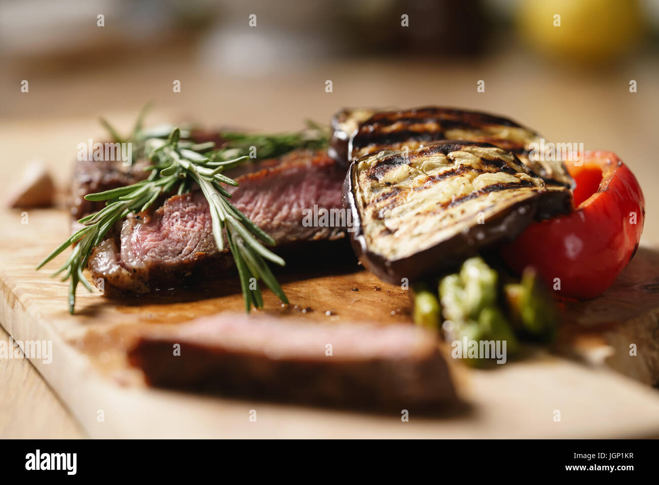piece of rib eye steak with vegetables Stock Photo Alamy