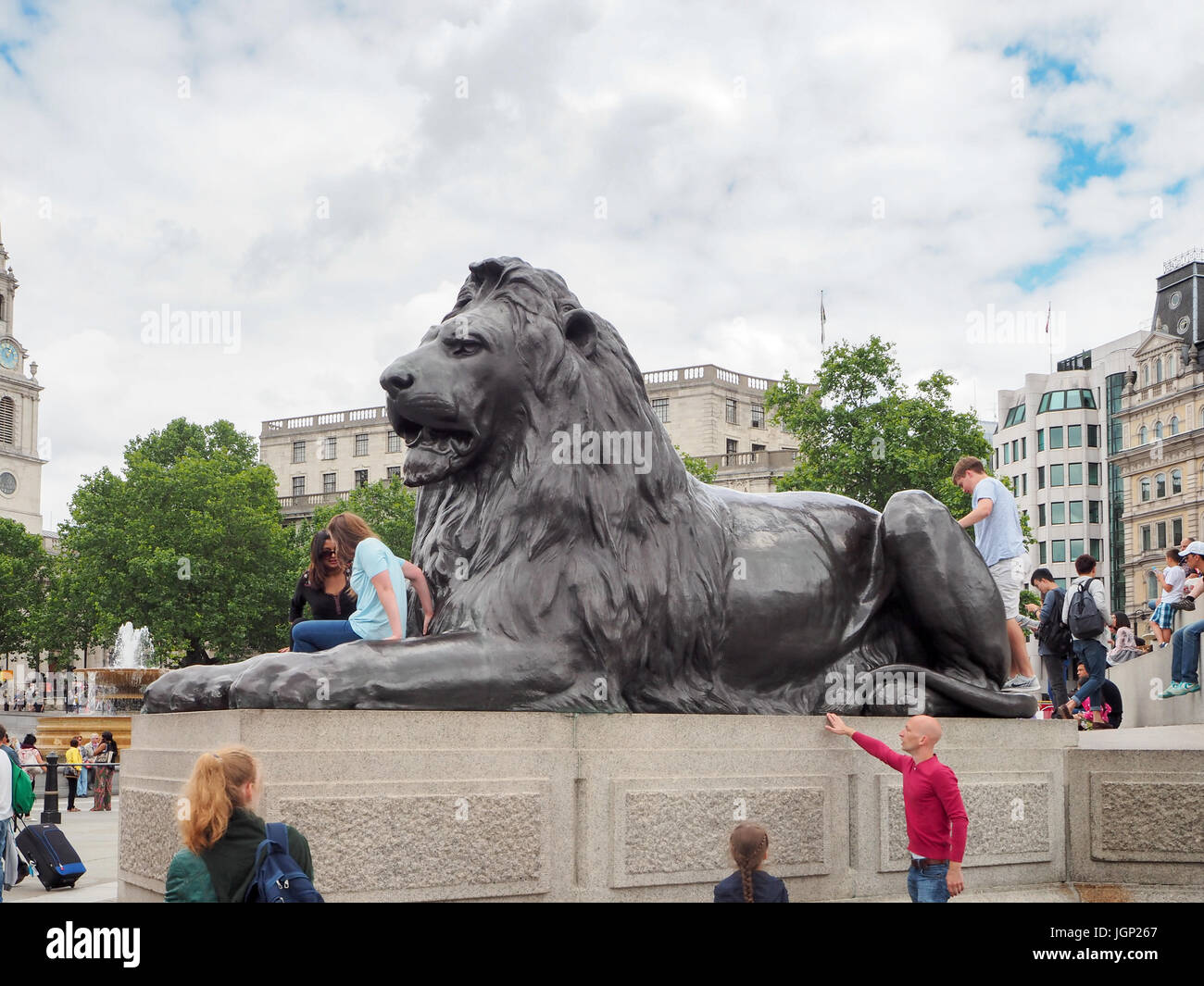 Trafalgar Square, London, Britain, United Kingdom, Summer 2016: [ Lion sculptures known as Landseer Lions ] Stock Photo