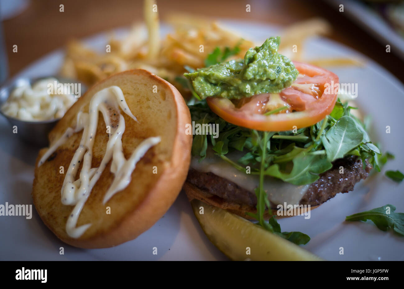Open face pesto burger Stock Photo Alamy