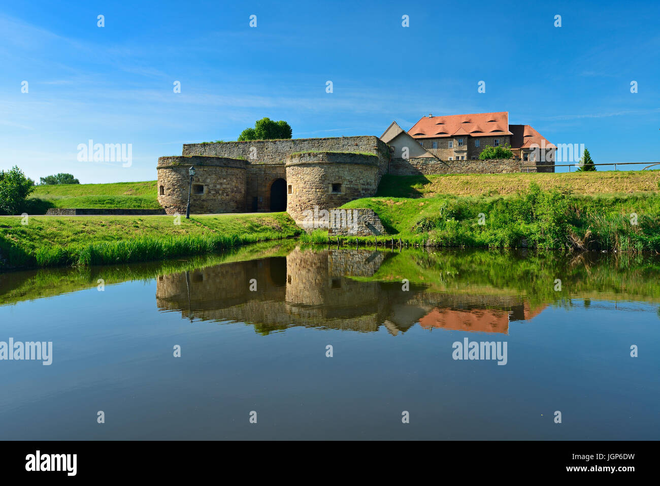 Water castle and fortress Heldrungen, gate building with bastions, exterior moat, at back the Renaissance castle, Heldrungen Stock Photo