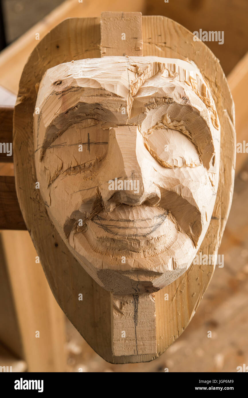Carved face of an unfinished wooden mask, wooden mask carver, Bad Aussee, Styria, Austria Stock Photo