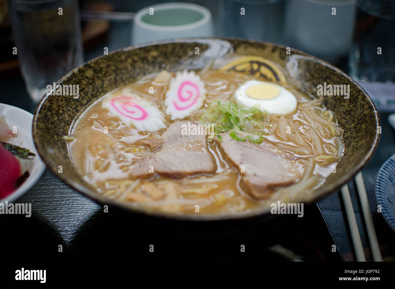 Bowl of ramen with garnishes. Stock Photo
