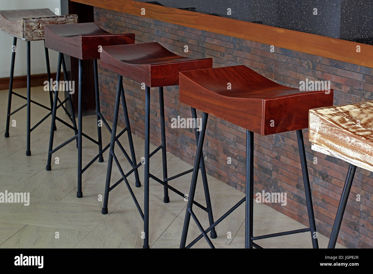 stool in front of counter bar at coffee shop Stock Photo