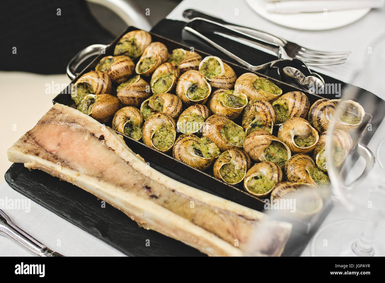 Bourgogne Escargots, Snails with herbs butter, with marrow on plate of