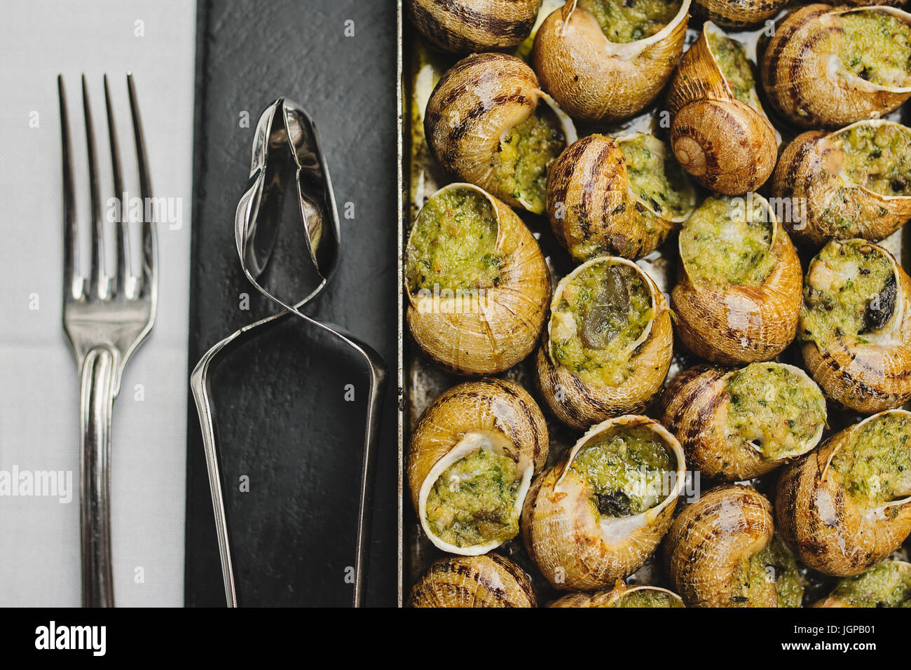 Bourgogne Escargots, Snails with herbs butter, with marrow on plate of