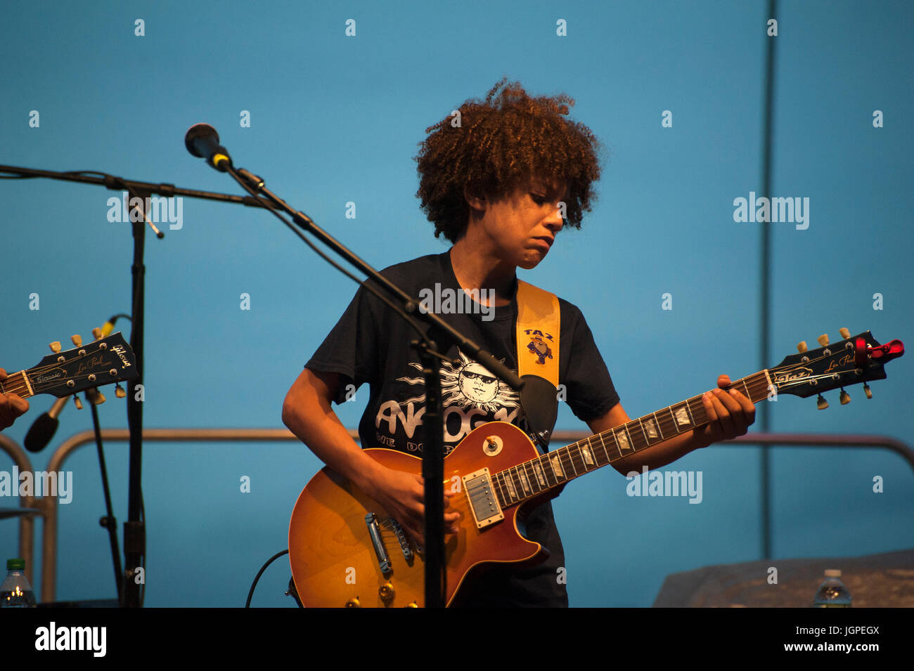 Brandon Niederauer “Taz,” a 14-year-old guitarist and vocalist, joined the Los Lobos band for a River & Blues Festival concert in Battery Park City. Stock Photo