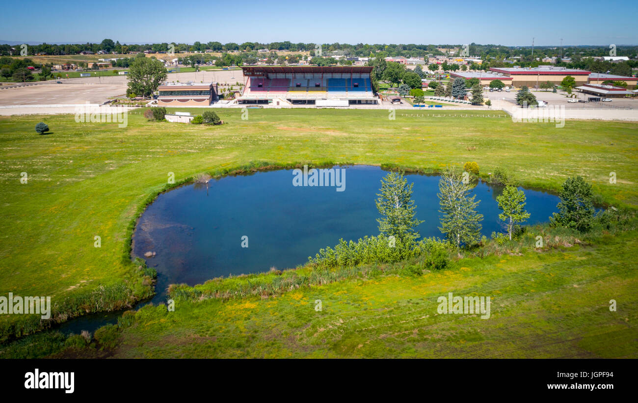 Outdoor Racing Pools Pool of water and grassy field make up the inner of a racing track ...