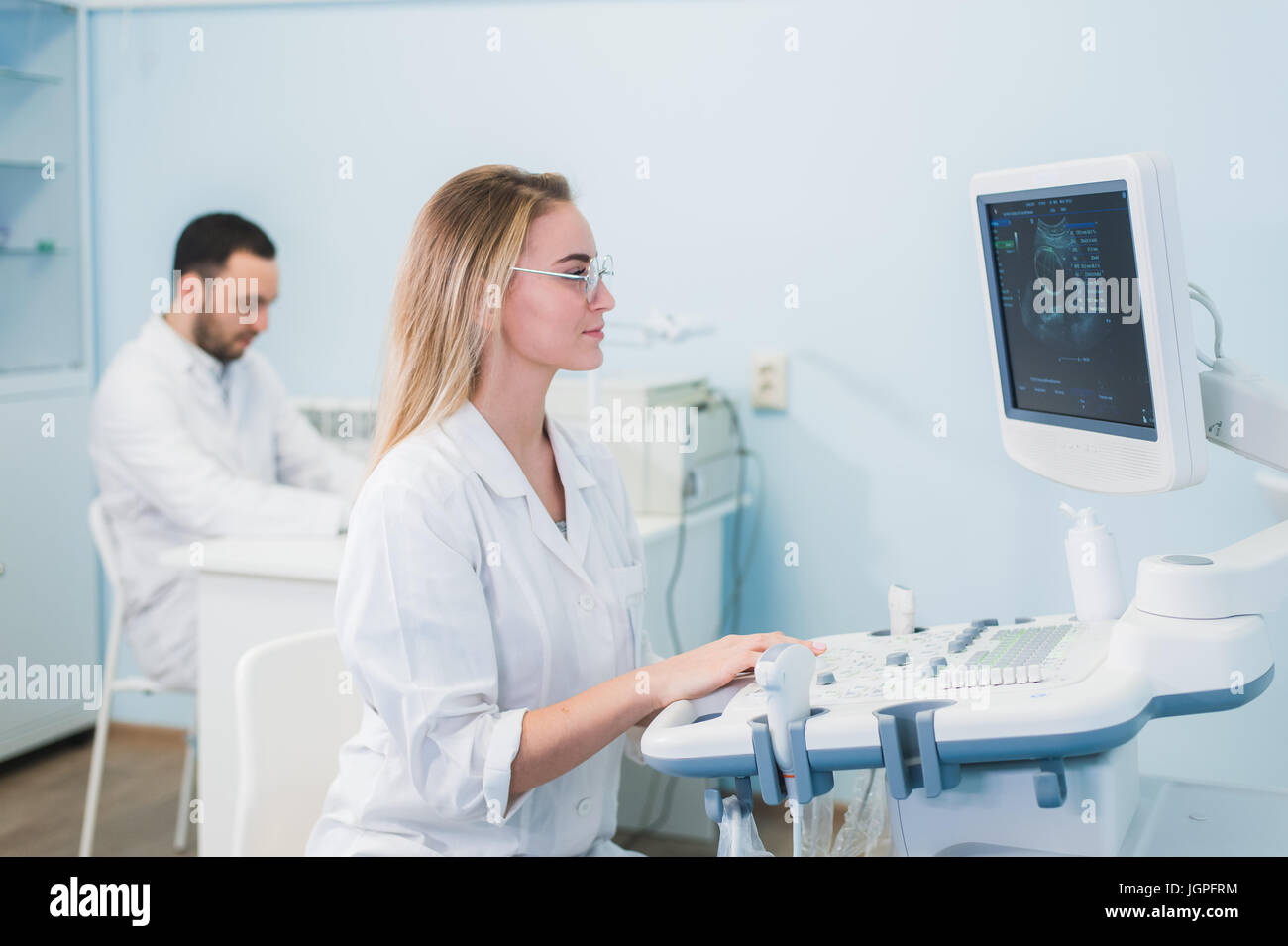 researchers team work at computer scientific analysing data out scientific test in chemistry laboratory Stock Photo