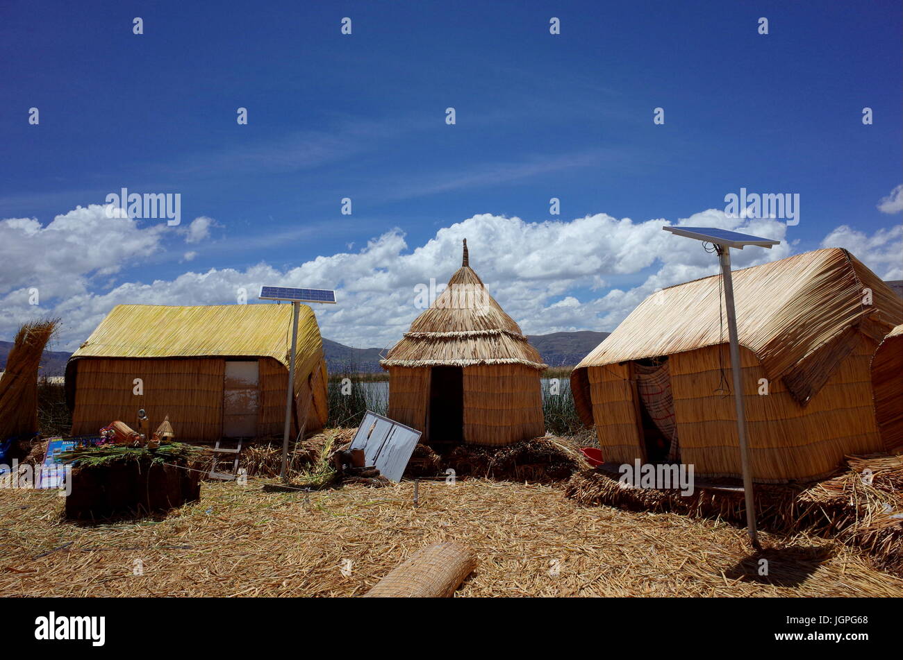 Reed huts powered by solar energy on the Floating Islands on Lake ...
