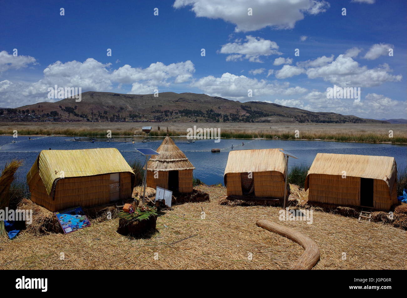 Reed huts powered by solar energy on the Floating Islands on Lake ...