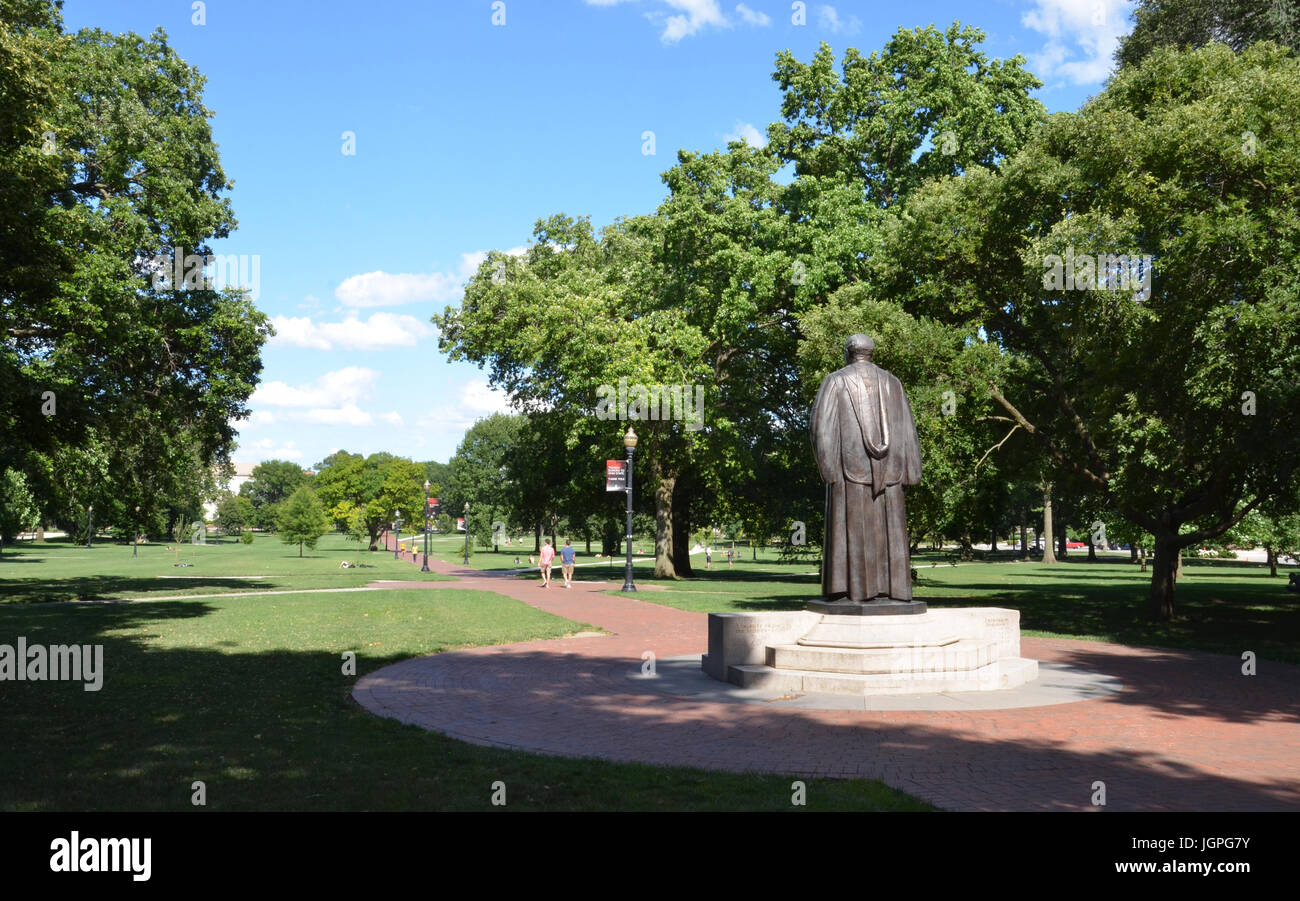 COLUMBUS, OH - JUNE 25: A statue of past president William Oxley Thompson overlooks the Oval at Ohio State University in Columbus, Ohio on June 25, 20 Stock Photo
