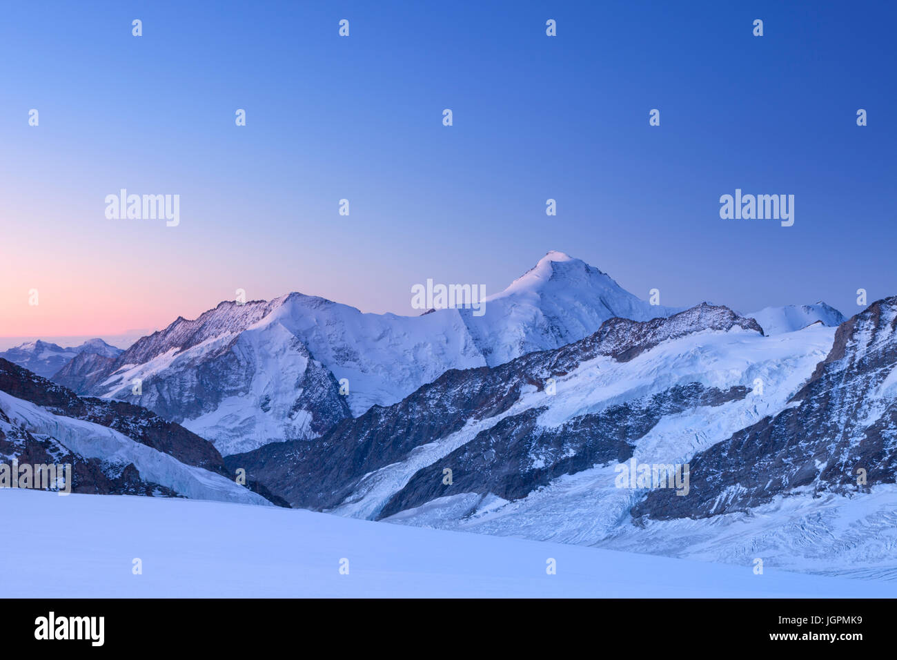 Dawn at Jungfraujoch in Switzerland on a clear morning. Stock Photo