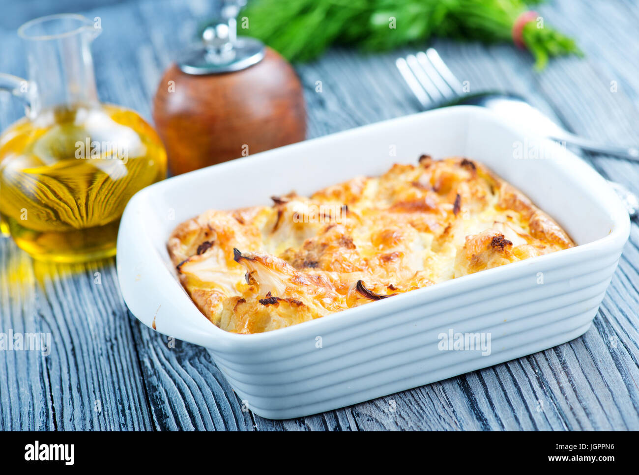 baked cauliflower with egg and cheese Stock Photo Alamy