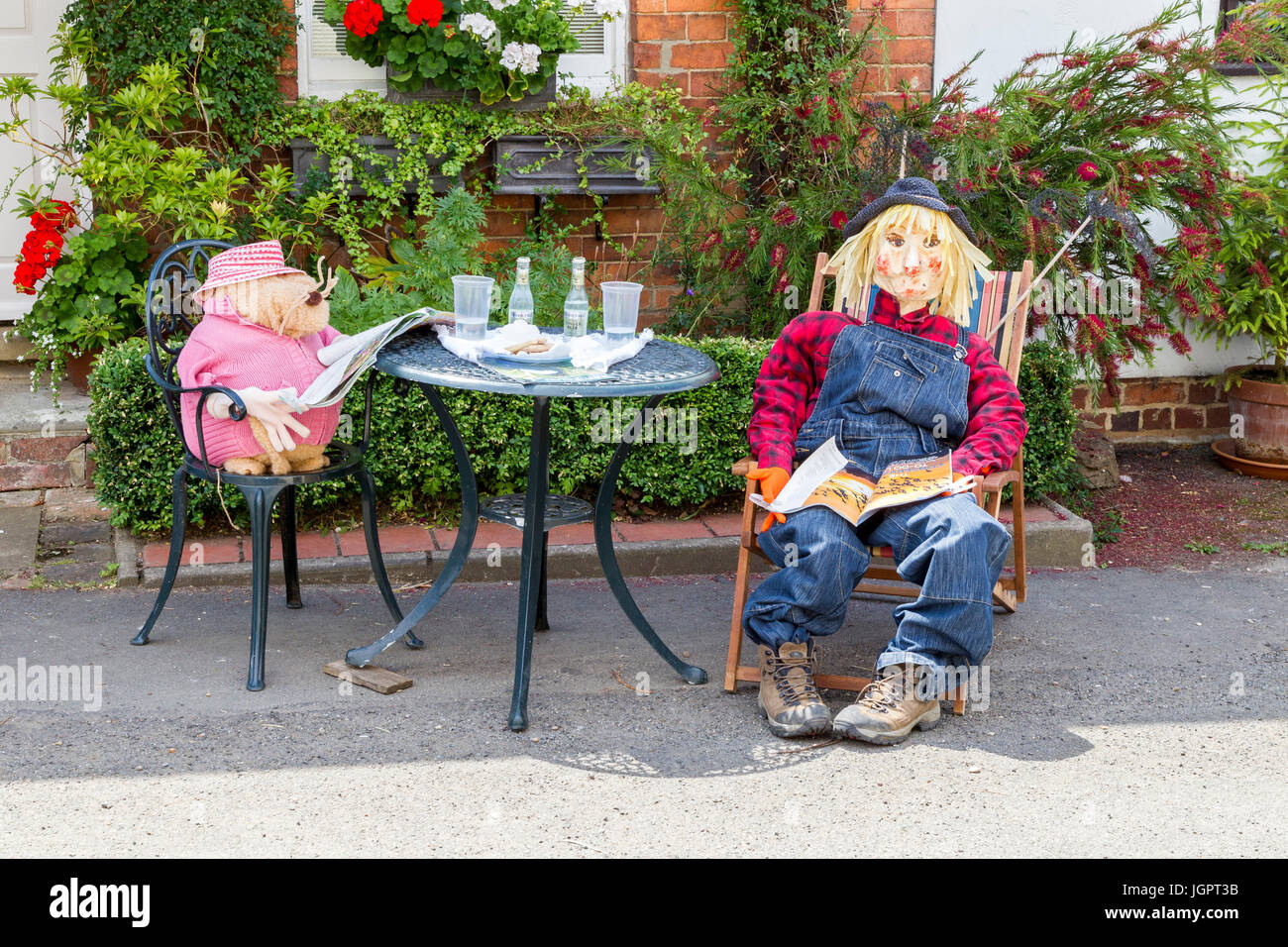 Crick, Northamptonshire, UK. 9th July 2017. Weather. Hot and humid on the second day of the Scarecrow Festival at Crick, lots of people enjoying the day looking at the Scarecrows dotted around the village. Credit: Keith J Smith./Alamy Live News Stock Photo