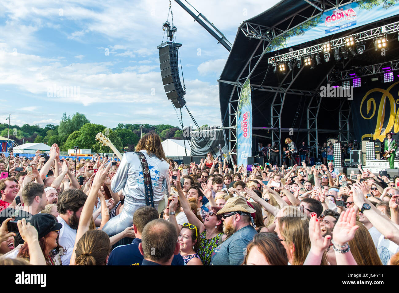 Coventry, UK. 9th July, 2017.  The annual Coventry Godiva Music Festival took place over the weekend with huge crowds attending for the duration of the festival.  The festival finished Sunday evening with The Darkness headlining.  Lead Singer, Justin Hawkins, goes on a walkabout through the crowd during the set.  Credit: Andy Gibson/Alamy Live News. Stock Photo