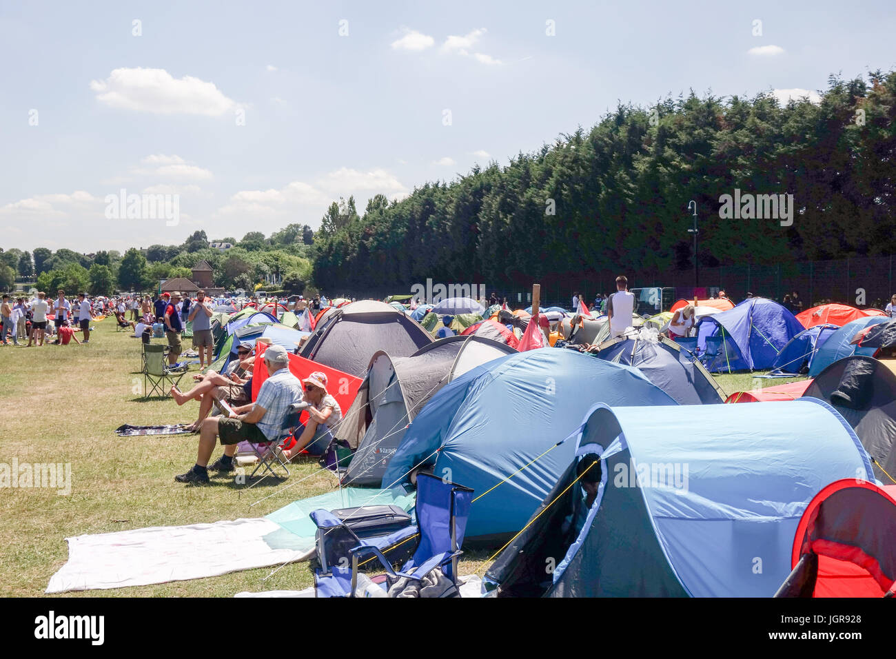 LONDON - JULY 5TH 2017: Tennis fans camp outside Wimbledon on the third day of the tournament at Wimbledon Park Stock Photo