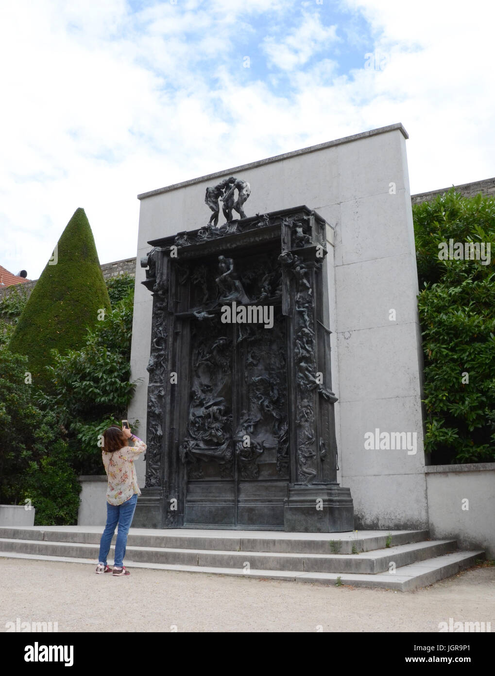 PARIS AUG 3 A visitor takes a photograph of the Gates of Hell at the