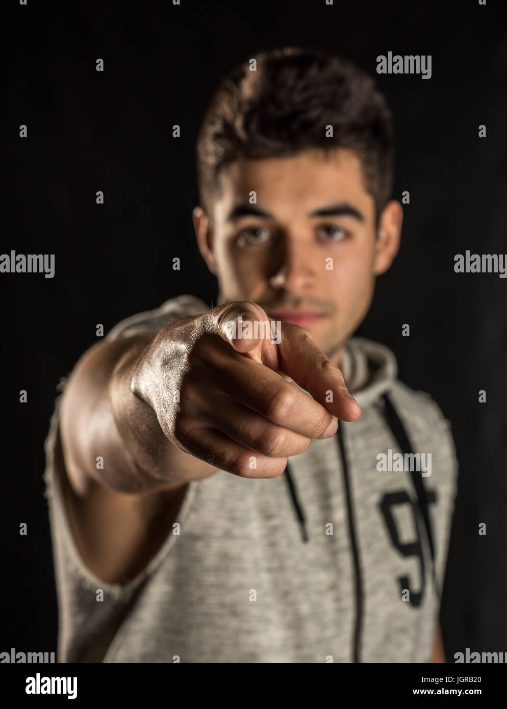 Black man pointing camera in hi-res stock photography and images - Alamy