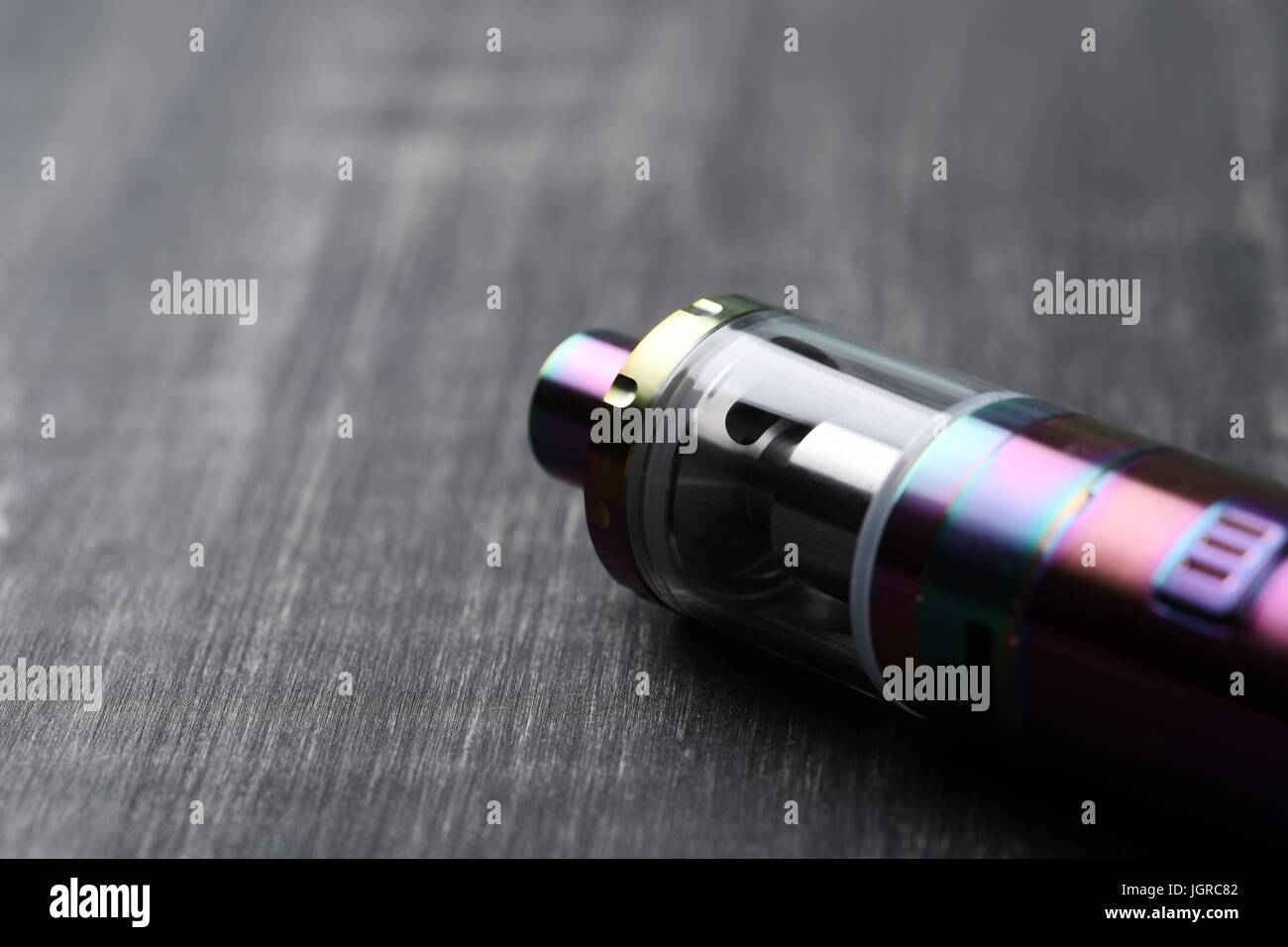 Vaping device on the wooden table Stock Photo