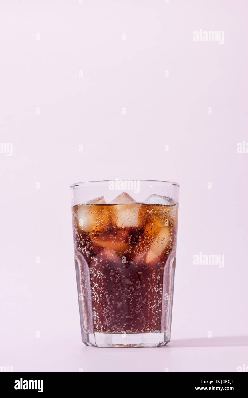 Cola and ice cubes in a glass Stock Photo