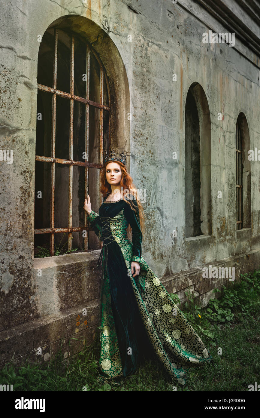 Portrait of a beautiful red-haired woman in green medieval dress Stock  Photo - Alamy