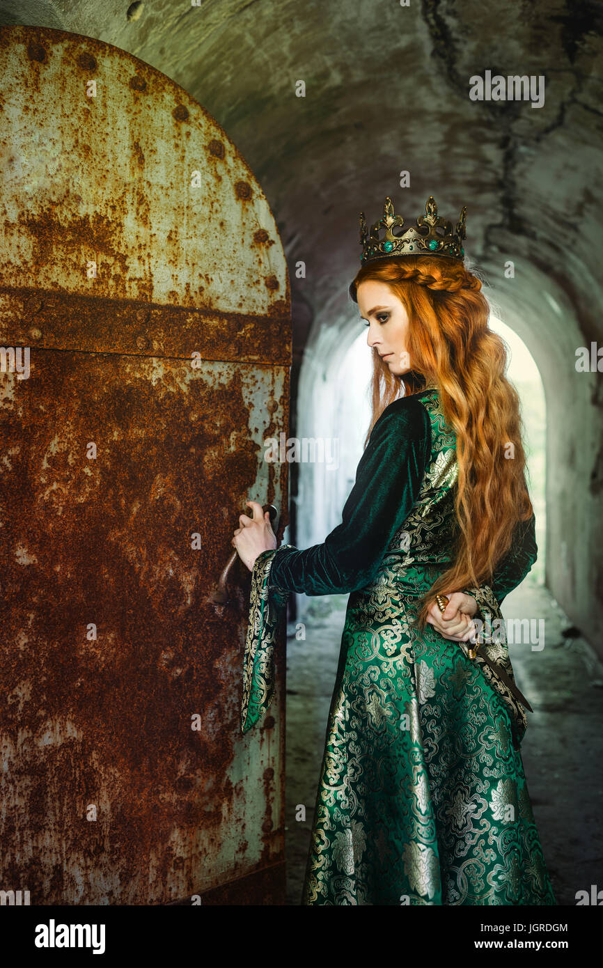 Red-haired woman in a green medieval dress near the castle Stock Photo - Alamy Red-haired woman in a green medieval dress near the castle Stock Photo - Alamy