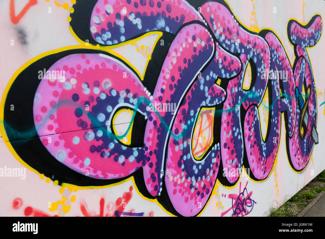 Graffiti covers the side of a wall in Calder Holmes Park, hebden Bridge Stock Photo