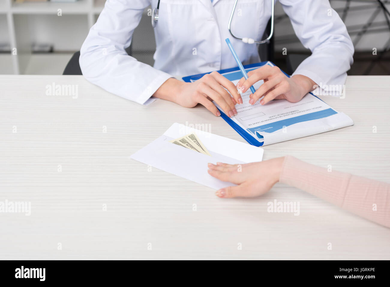 Doctor money envelope hi-res stock photography and images - Alamy