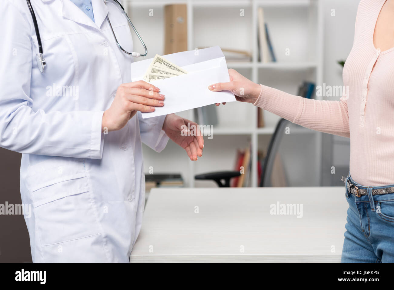 Doctor money envelope hi-res stock photography and images - Alamy