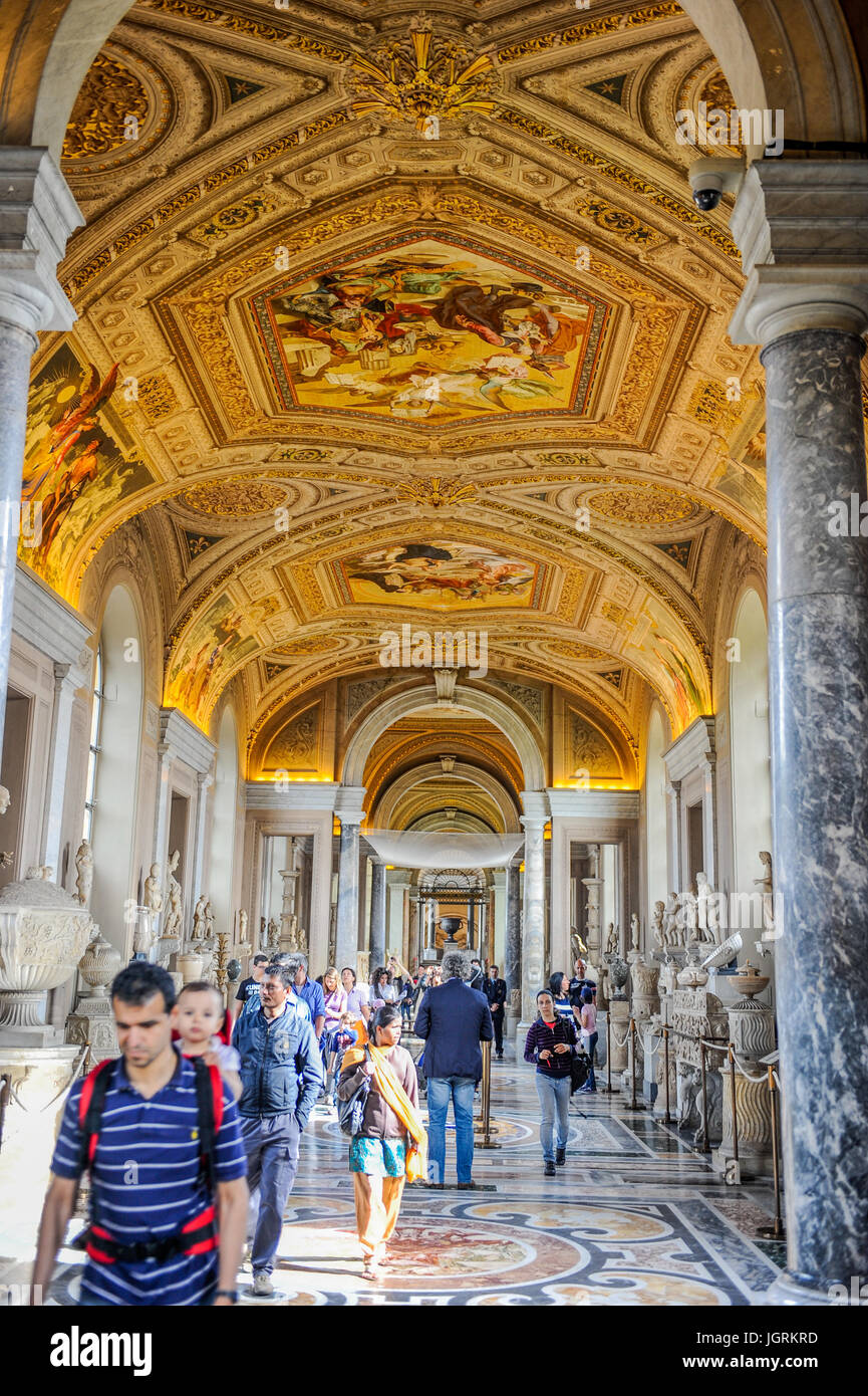 Interiors of Vatican Museums with tourists Stock Photo