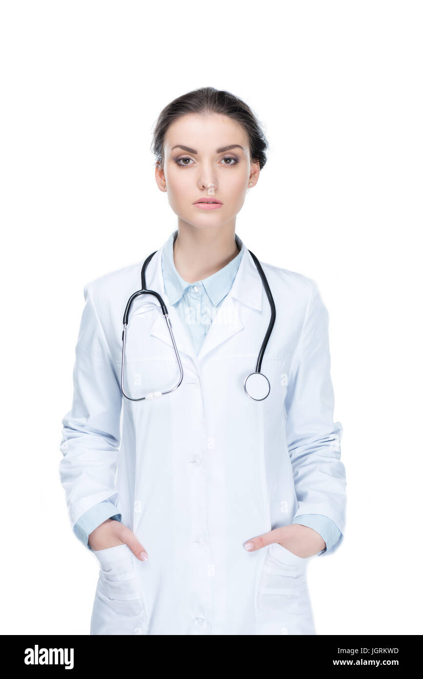 young general practitioner with stethoscope looking at camera isolated ...