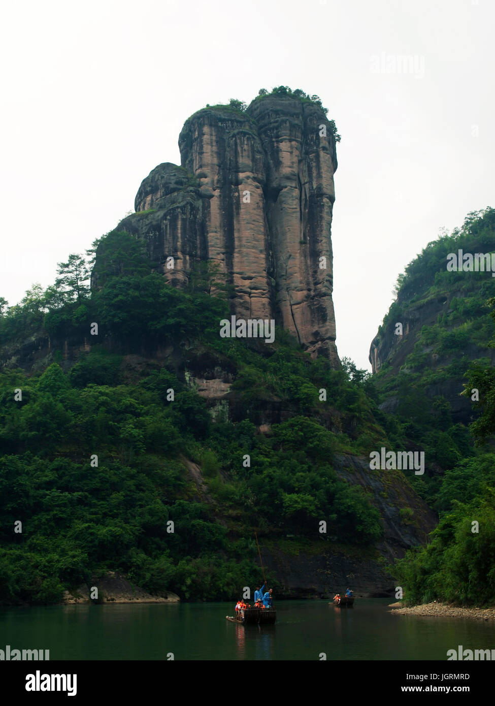 bamboo rafts with chinese tourists in Wuyishan, China Stock Photo