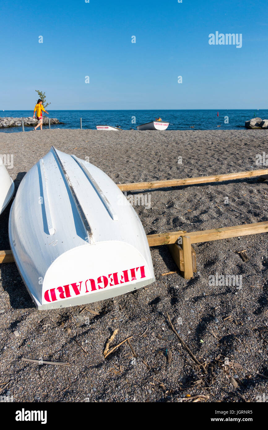 Wooden lifeboats used by local lifeguards at Kew beach on the shores of Lake Ontario in Toronto Canada Stock Photo
