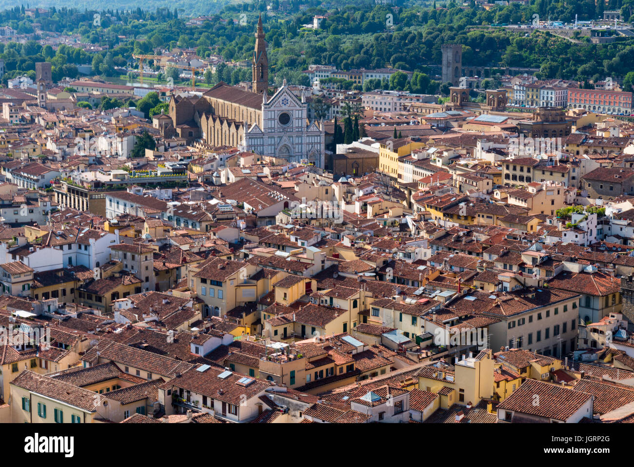 City of Florence viewed from the dome of the cathedral of Santa Maria with Basilica of Santa Croce in the distance. Stock Photo