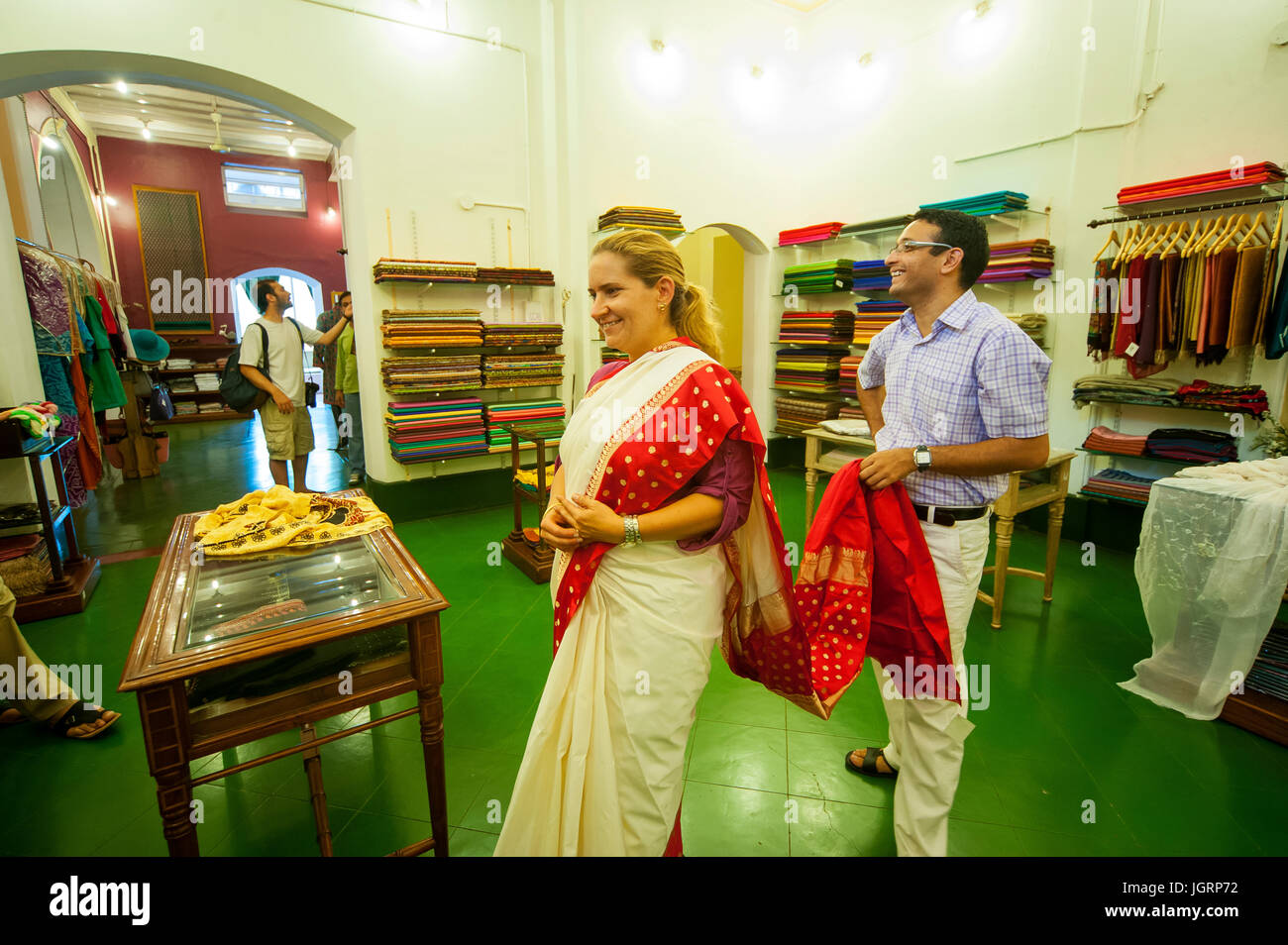 Tourist trying some indian traditional clothes at a Mysore luxury