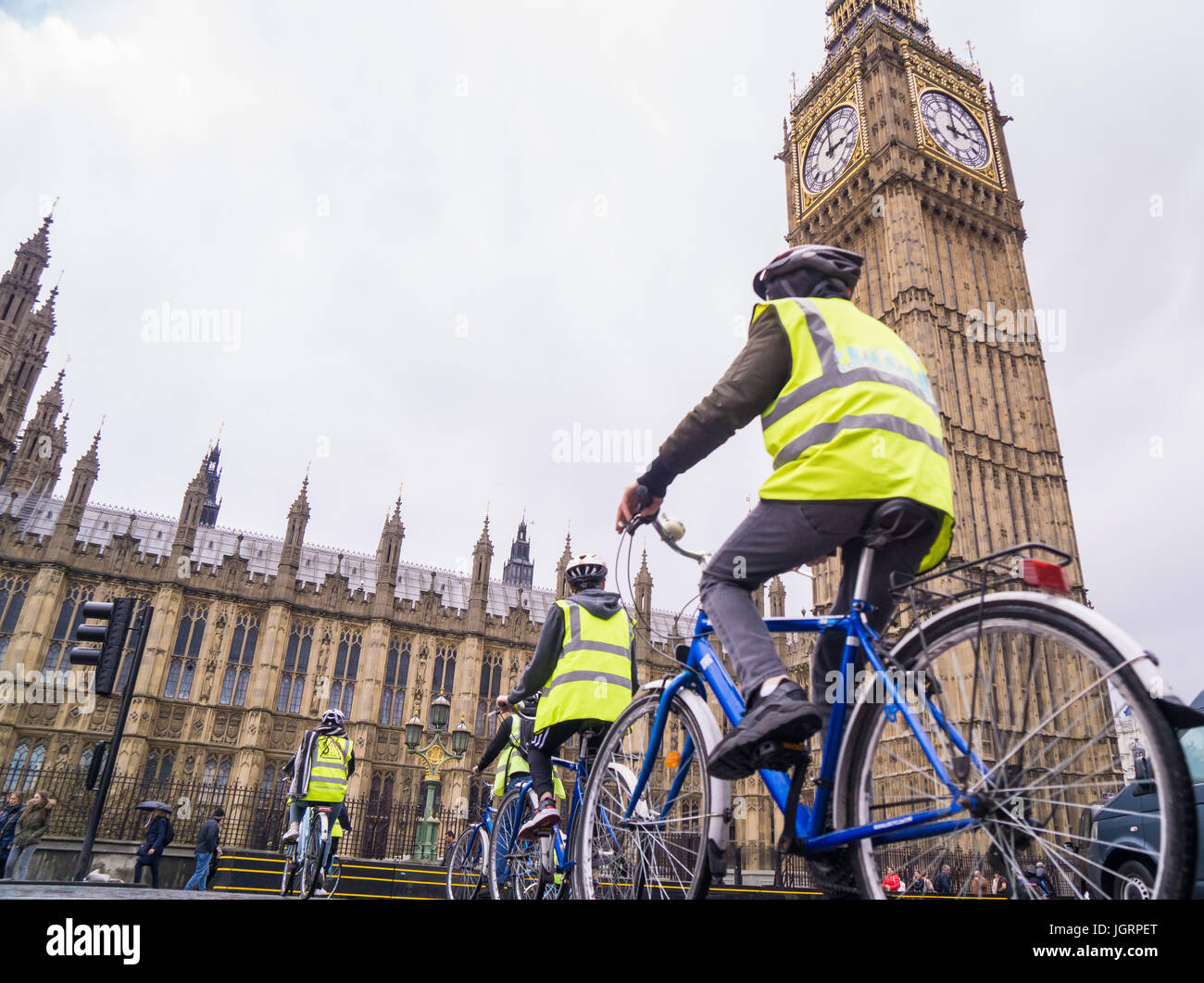 Cyclists in a group riding at Westminster Square, London Stock Photo
