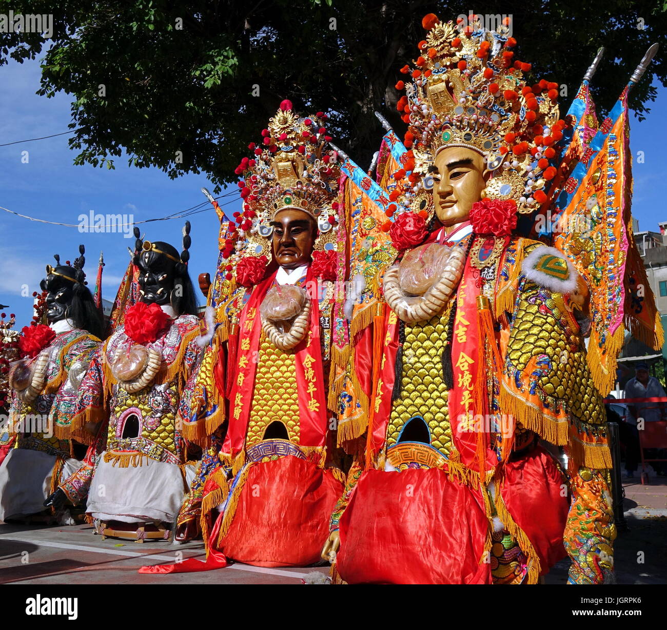 KAOHSIUNG, TAIWAN -- JUNE 10 , 2017: A set of large elaborate masks and costumes worn by dancers to represent deities popular in Taiwan's folk religio Stock Photo