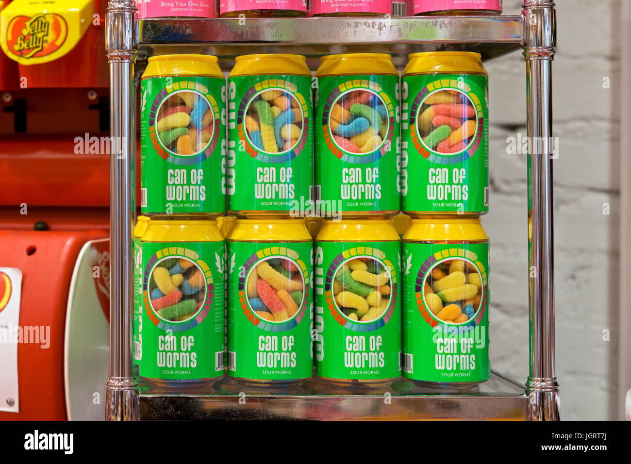 CAN OF WORMS. Several cans of worms for sale at It'sugar on Briadway in lower Manhattan, New York City Stock Photo