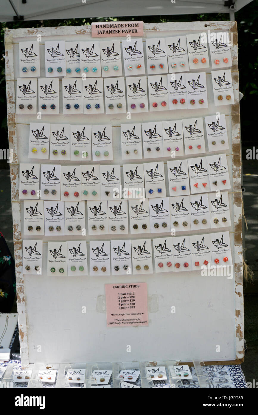 Japanese handmade earrings made out of paper for sale at a street fair in Greenwich Village, downtown Manhattan, New York City Stock Photo