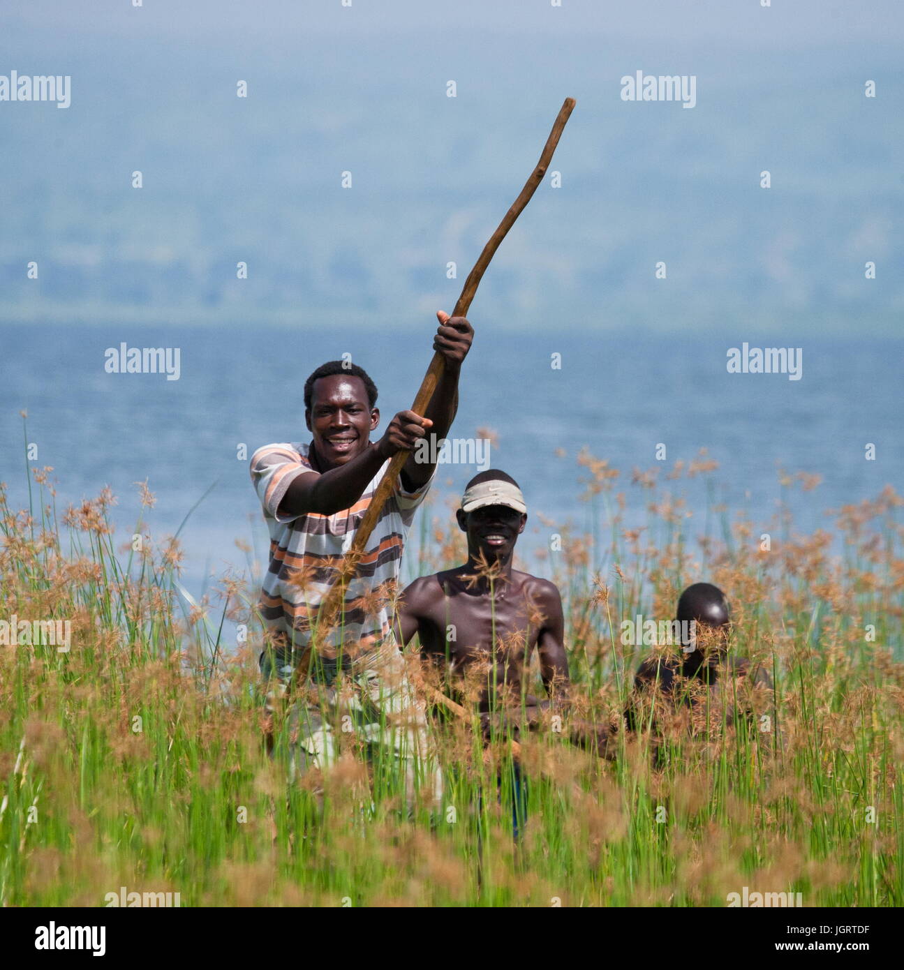 MURCHISON FALLS, WHITE NILE RIVER, UGANDA – JUNE 11, 2012: Murchison Falls. Uganda. Fishermen from the village fishing on the White Nile Stock Photo