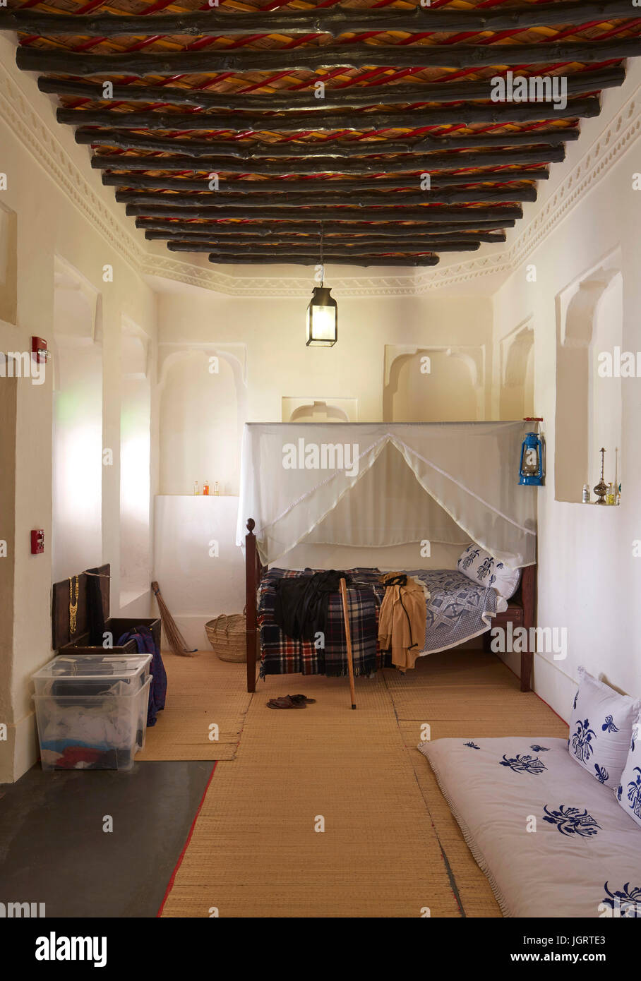 Interior view showing typical early Qatari abode. Radwani House, Doha, Qatar.  Architect: John McAslan & Partners, 2017 Stock Photo - Alamy