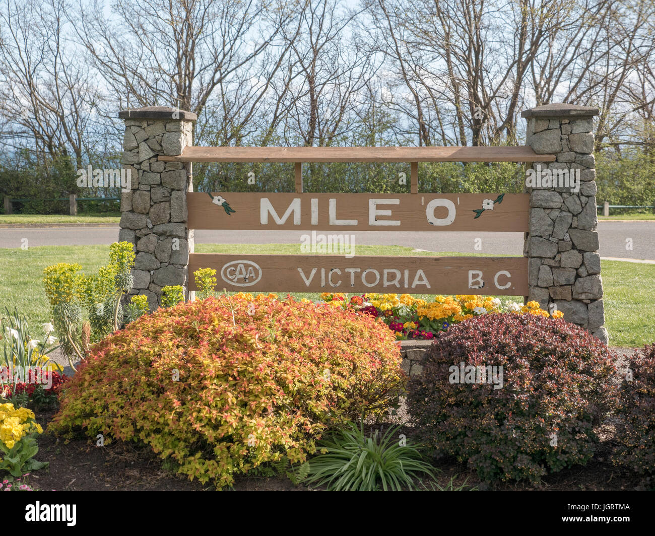 The Mile 0 Zero Marker From Behind At The End Of The Trans Canada Highway In Beacon Hill Park Victoria British Columbia Stock Photo