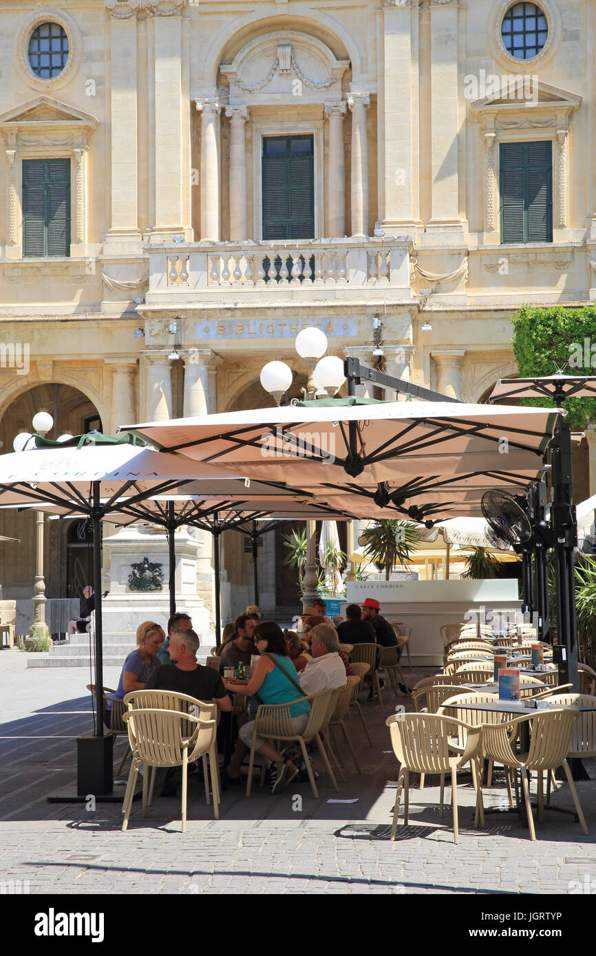 Cafes on Republic Square, in front of the National Library, in Valletta, Malta Stock Photo Alamy