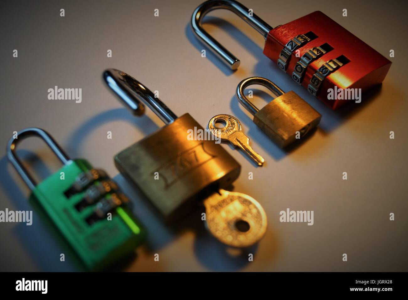 Colourful locks with key Stock Photo